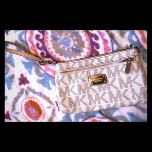 Michael Kors logo cream wristlet clutch